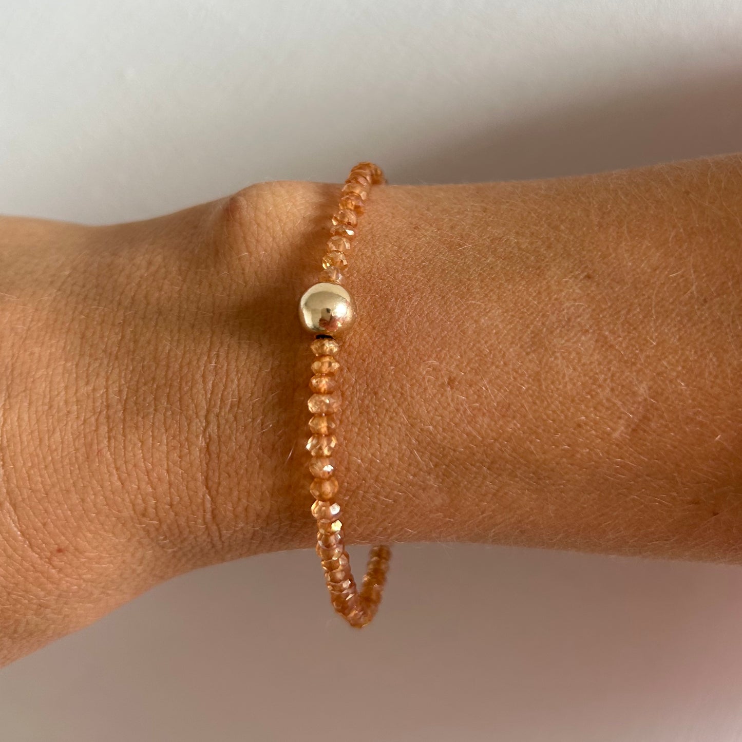 Golden orange citrine gemstone bracelet with gold bobble