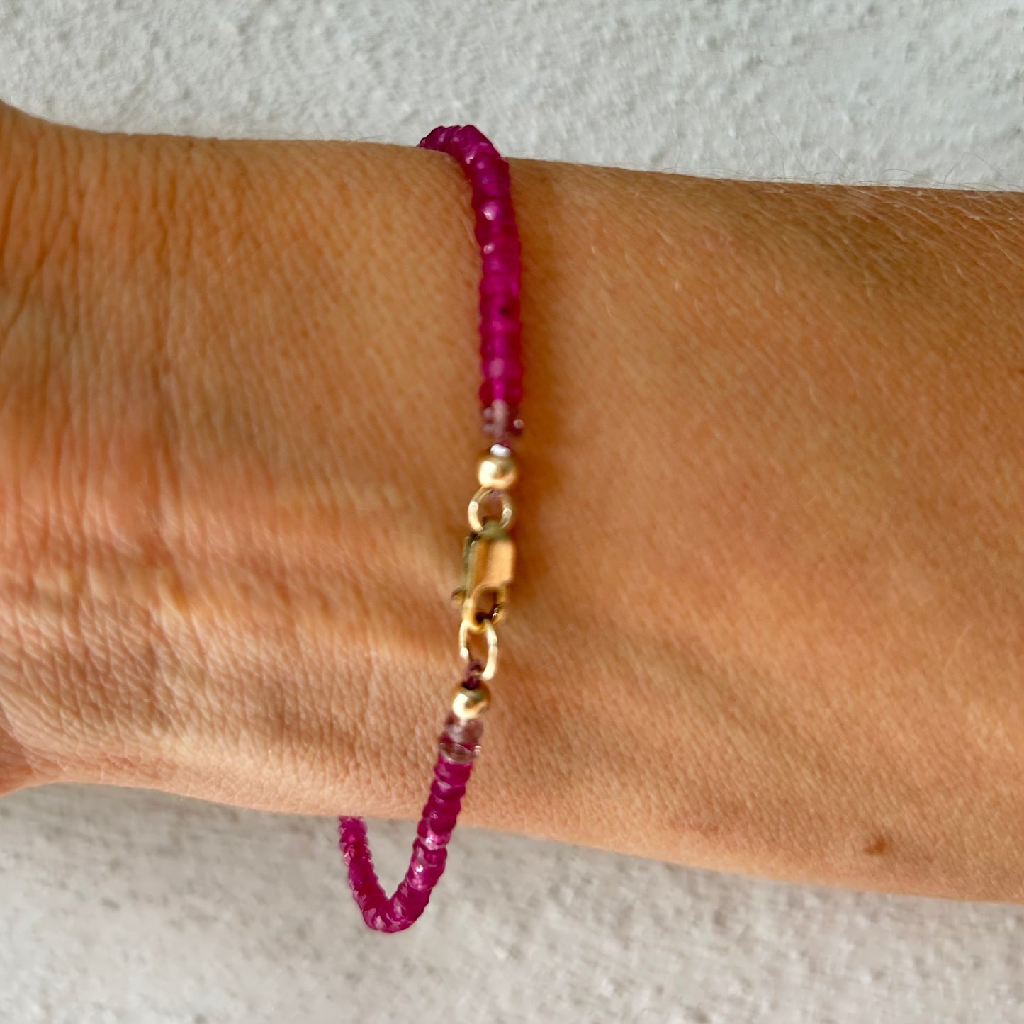 Pink ruby bracelet with grey tourmaline gem and yellow sapphires