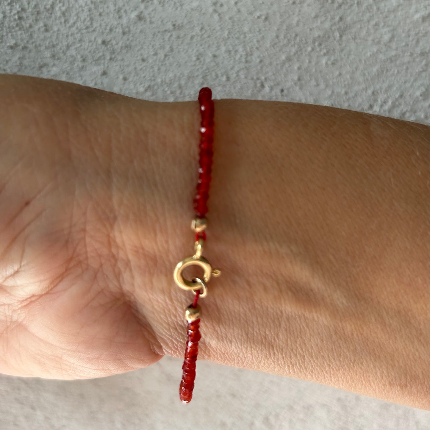 Cornellian gem bracelet with gold Bali beads